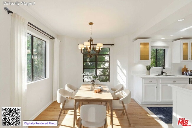 Building Photo - 13025 Moorpark St Unit 101