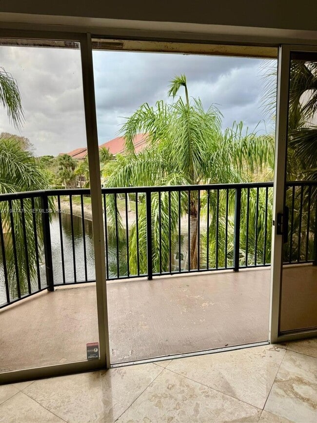 Photo - 8871 Wiles Rd Unit 306