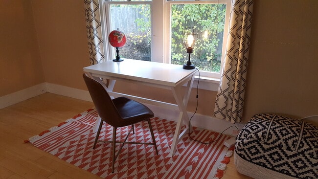 Desk easily coverts to a table for 4