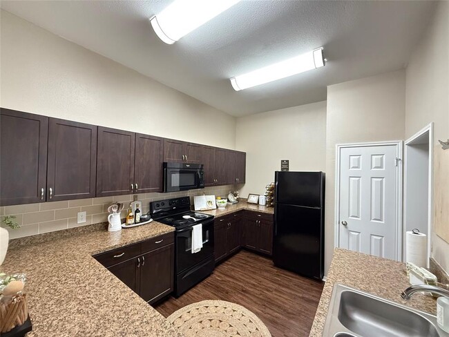 Building Photo - 6607 Brodie Ln Unit 432 Rental