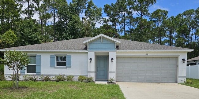 Building Photo - **BEAUTIFUL 3/2 HOME IN PALM COAST