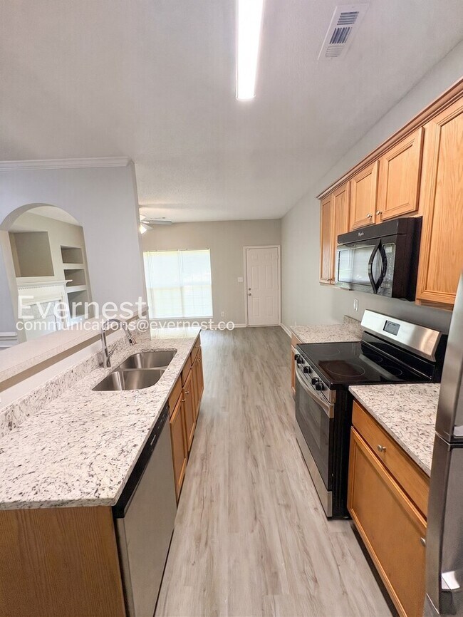 Photo - 3 Bed, 2 Bath Home with Garage / Pet-Friendly / Available Now!