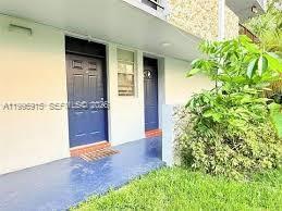 Building Photo - 5495 NW 10th Ct Unit 104