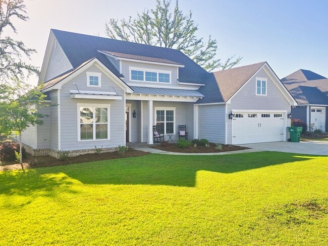 Photo - Spacious 4BR/3BA Home with Open Floor Plan, Screened Porch & Fenced Backyard