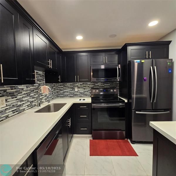 Building Photo - 6600 Cypress Rd Unit 307 Rental