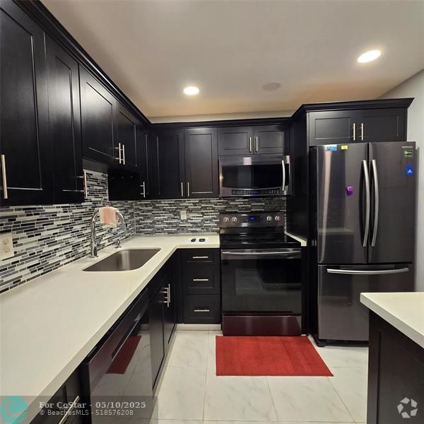 Building Photo - 6600 Cypress Rd Unit 307 Rental