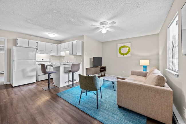 Living Room | Kitchen - 1BD Standard - Summer Green Apartments