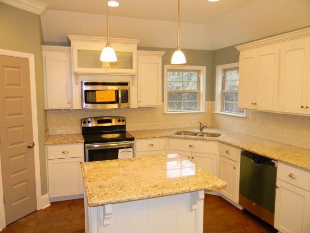 Photo - Modern 4BR Home with Open Layout, Granite Counters & Community Pool Access