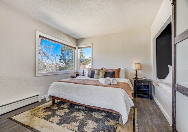 Natural light with oversized windows and French doors - 2022 Woodburn St Unit The Emperor Upstairs #1