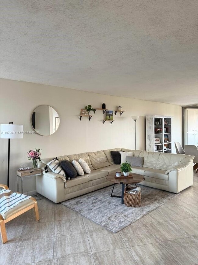 Building Photo - 6911 Environ Blvd Unit 8L