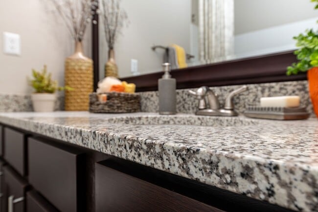 Bright bathroom with granite counters