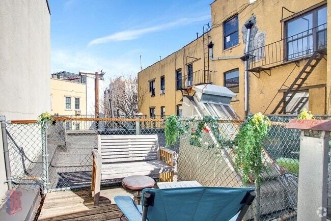 Building Photo - 411 E 12th St Unit PHW Rental