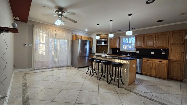 Photo - Large 5-Bedroom Home with Backyard Pool, G...