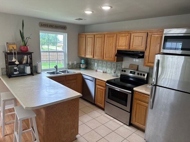 Photo - Available as soon as mid-August! Recently Updated 3 Bedroom, 2 Bathroom Rogers Home with All Appl...