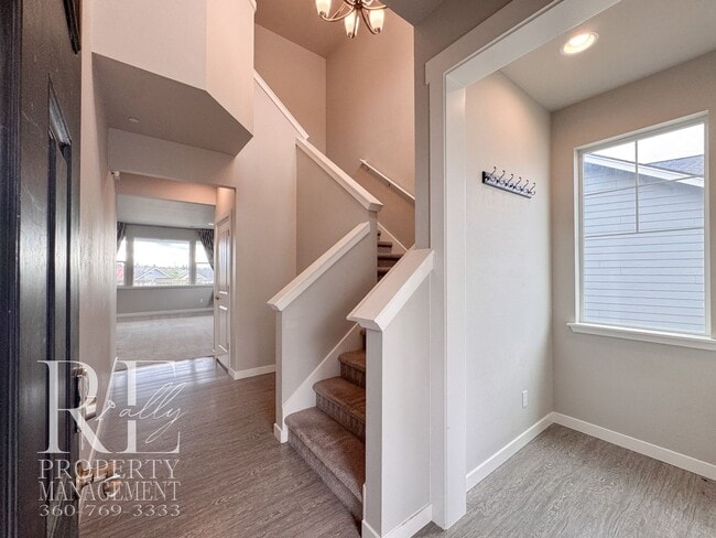 Photo - Vaulted Ceilings, Tree-Lined Views & a Spacious Primary Suite Retreat