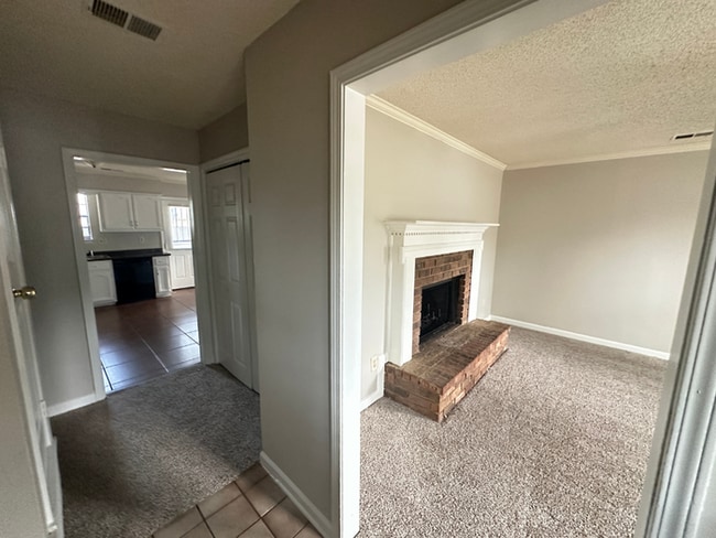 Photo - MOVE-IN READY! 3BR/2BA in Quiet Cove | Brick Fireplace | Fenced Yard & Patio!