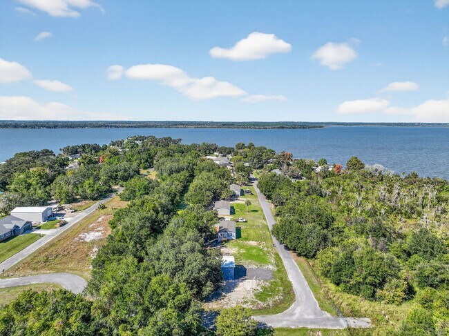 Photo - Brand-New Home on Canal to Lake Griffin – ...