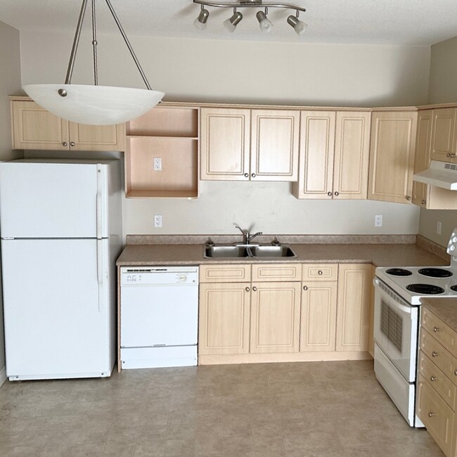 Photo - 9914-9101 101 Ave Unit 115