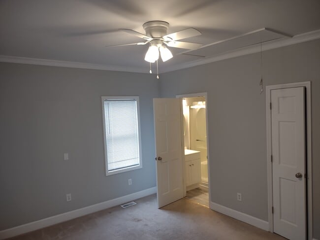 Huge master bedroom with two standard closets and en suite bathroom - 1208 E Main St