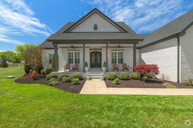 Building Photo - unning custom-built home on a full acre in...