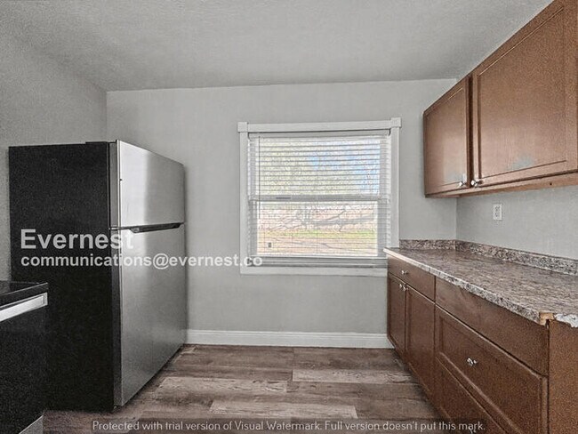 Photo - 4 Bed, 2 Bath Home with Off-Street Parking / Pet-Friendly / Available Now!