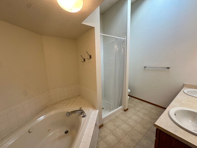 Photo - Stylish 3rd Level, Private 2 bedroom Apartment With LVP Flooring, Decks, Gas Fireplace & In-Unit ... Unit 302