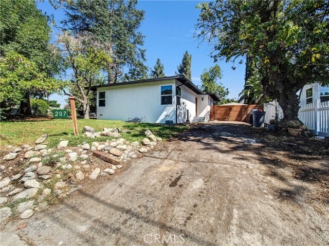 Building Photo - 207 W Arrow Hwy Rental
