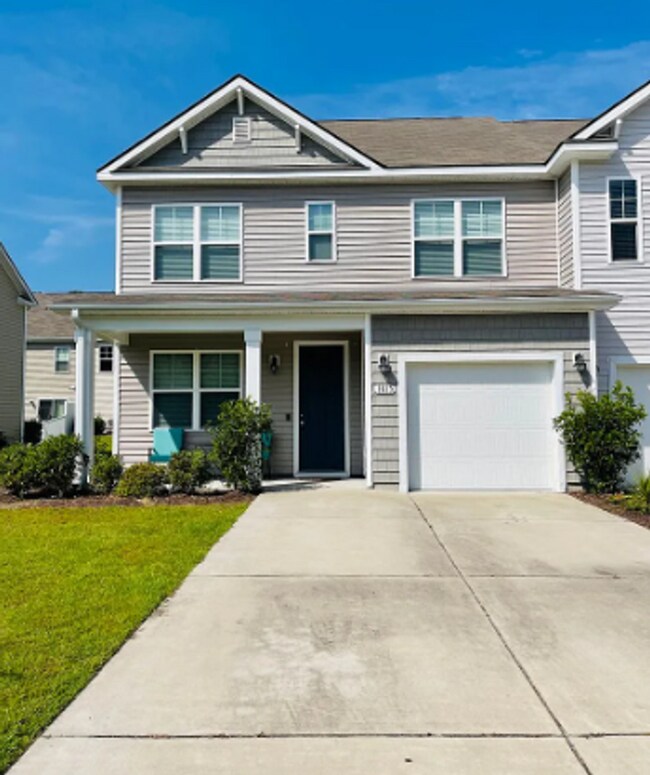 Building Photo - Spacious 4BR/3.5BA Townhome Minutes from Campus – Perfect for Roommates or Families