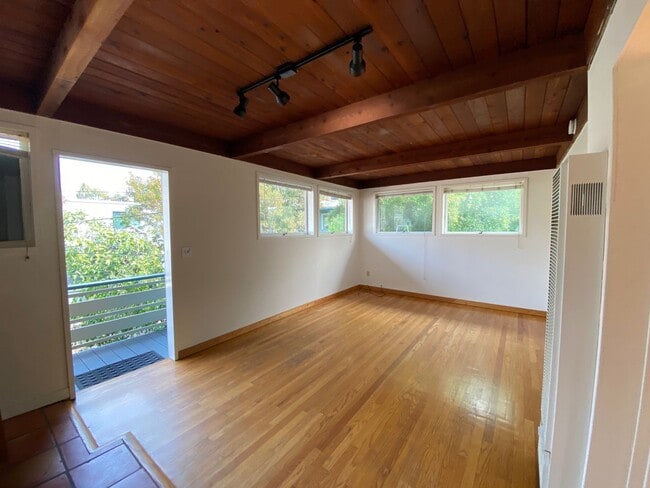 Photo - Top-Floor 1BD/1BA Apartment with Wood Ceilings, Garden Setting, and Easy North Berkeley BART Access Unit 1228 C