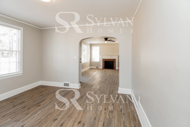 Photo - The living is easy in this 3 bedroom, 2 bathroom brick home