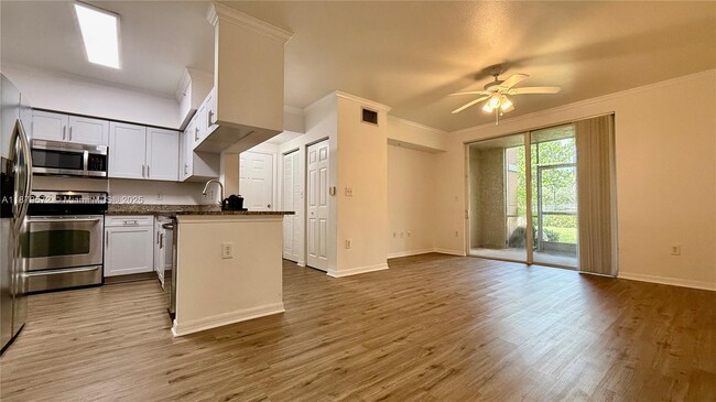 Building Photo - 6482 Emerald Dunes Dr Unit 105 Rental
