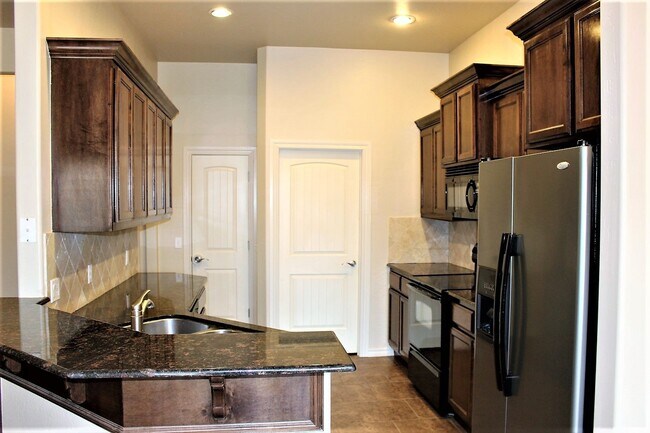 Photo - Gorgeous 4 Bed 2 Bath in Gated Community