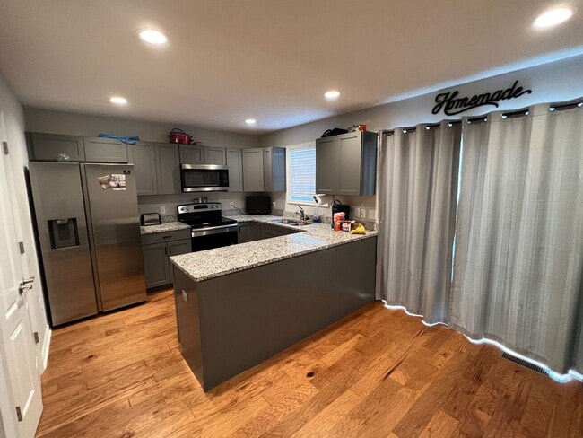 Photo - End Unit Townhouse with Garage and Unfinished Basement