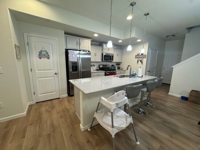 Photo - Stylish 3-Bedroom Townhome with Mountain Views & 2-Car Garage