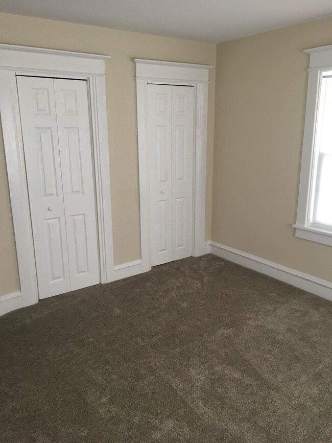 Bed room with two closets with organizers - 317 Richey Ave Unit 2nd fl