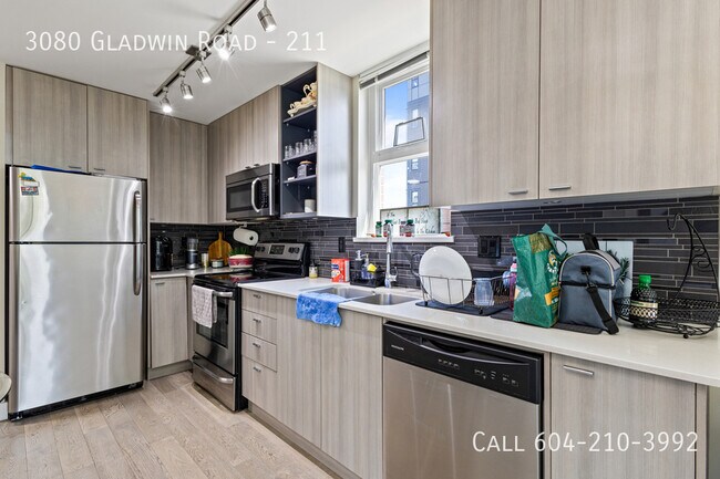 Photo - Bright Corner Condo with 2 Parking Unit 211