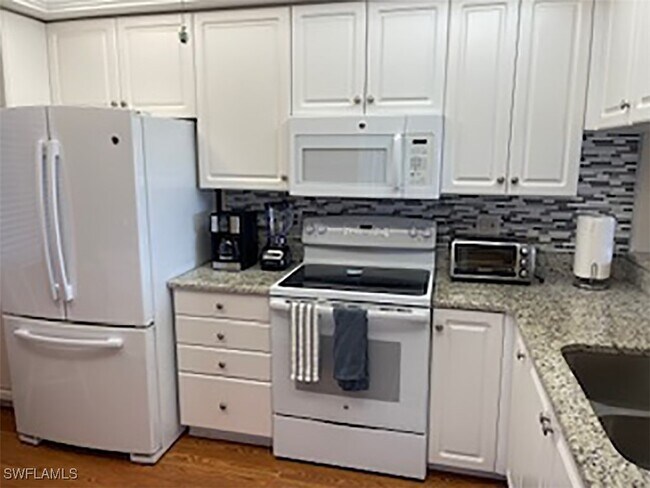 Building Photo - 14751 Hole in 1 Cir Unit 205 Rental