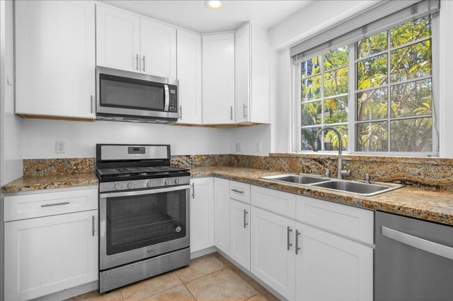 Photo - Corner lot home on a classic tree lined Beverly Hills street