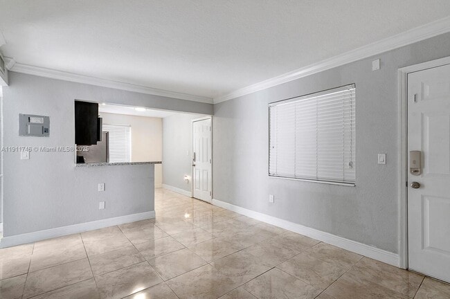 Building Photo - 241 S Royal Poinciana Blvd Unit 206