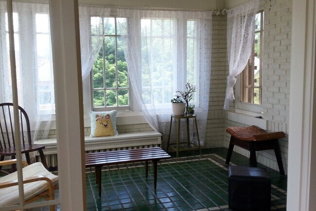 hand made tiles in sun room - Elthan Place