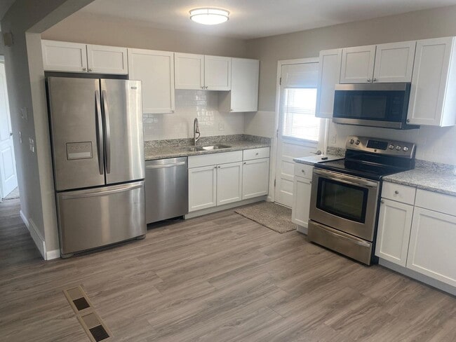 Photo - Updated 4 bedroom, 2 bath! Available 7/10/26!