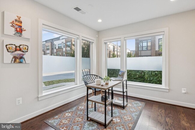 Photo - Perfectly located just steps from the Red Line Metro, this EYA-built Davis Model townhome at West...