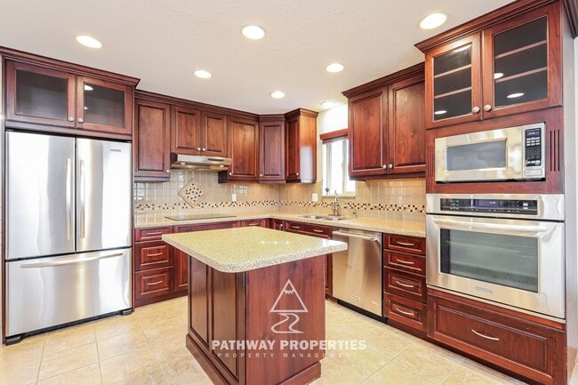 Photo - Well-Maintained 4 Bed / 2 Bath Single-Family Home with Separate Mother-In-Law Apartment – South S...