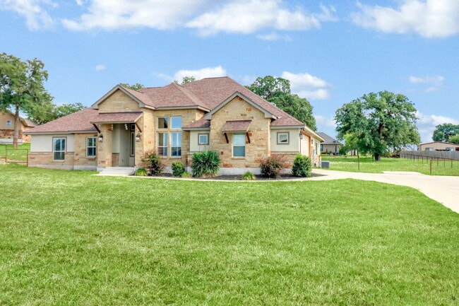 Photo - "Charming 4-Bed Oasis with Granite Touches & Cozy Fireplace in Floresville!"