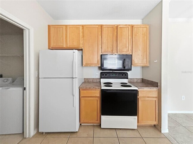 Photo - 10205 Courtney Palms Blvd Unidad 101