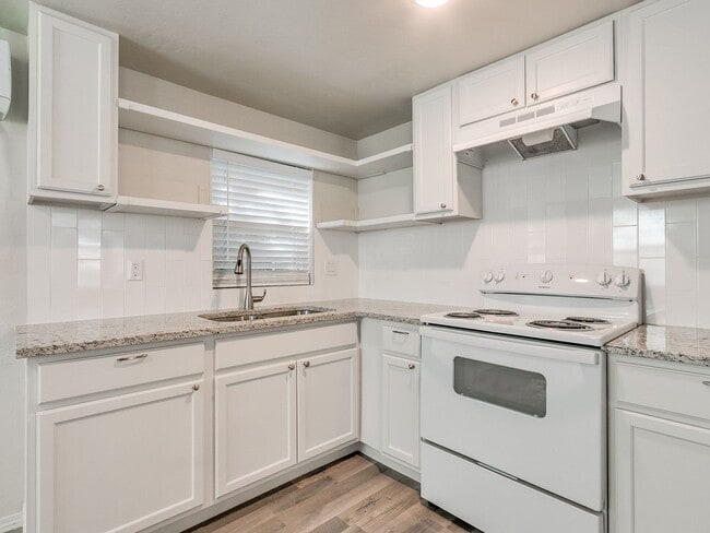 Photo - Newly renovated efficancy with fenced yard.