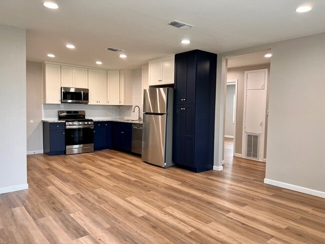 Custom kitchen cabinets and new stainless steel appliances - 1266 Dove St Unit A