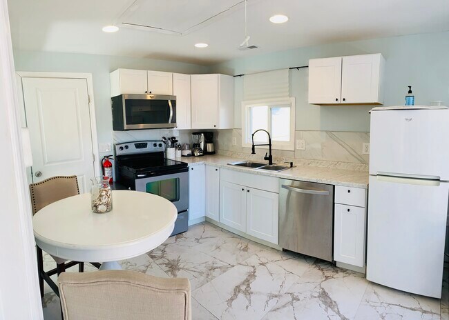 This photo has previous refrigerator, new stainless steel fridge now in cottage (but not in pic) - 749 1st St Unit Rear Cottage