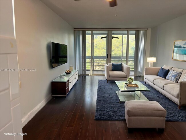 Building Photo - 9441 Evergreen Pl Unit 301