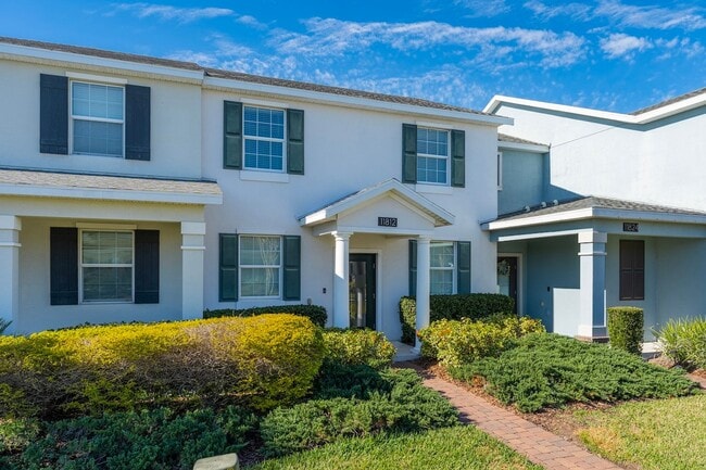 Building Photo - Immaculate 3/2.5 Townhome w/2-Car Garage in Storey Park of Lake Nona